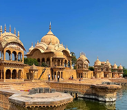 Historic sandstone chhatris of Kusum Sarovar and sacred waters at Govardhan